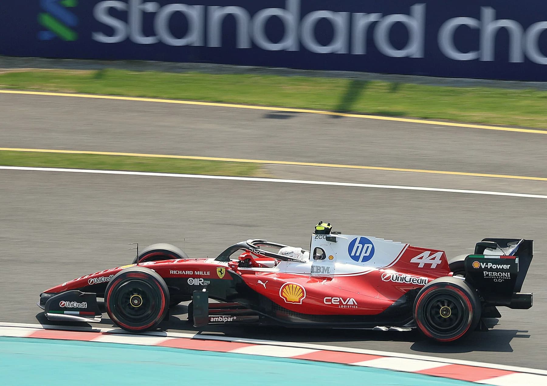 Lewis Hamilton exits Suzuka's final chicane in the Ferrari SF-26 during the 2026 Japanese Grand Prix weekend.
